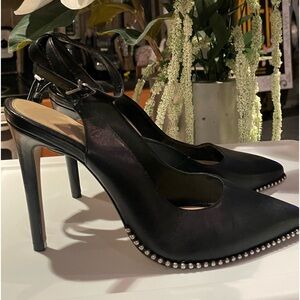 Black heels by Gianni Bini. Pointed toe w/silver studs and strap around ankle.